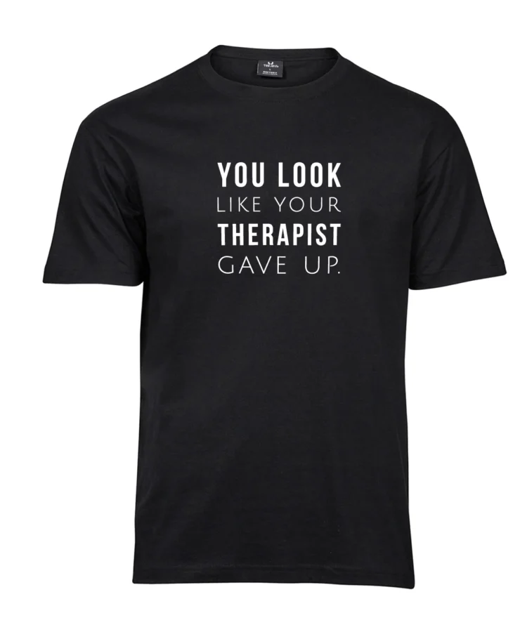 Must unisex T-särk valge tekstiga “YOU LOOK LIKE YOUR THERAPIST GAVE UP.”; esivaade, tootekujutis valgel taustal.