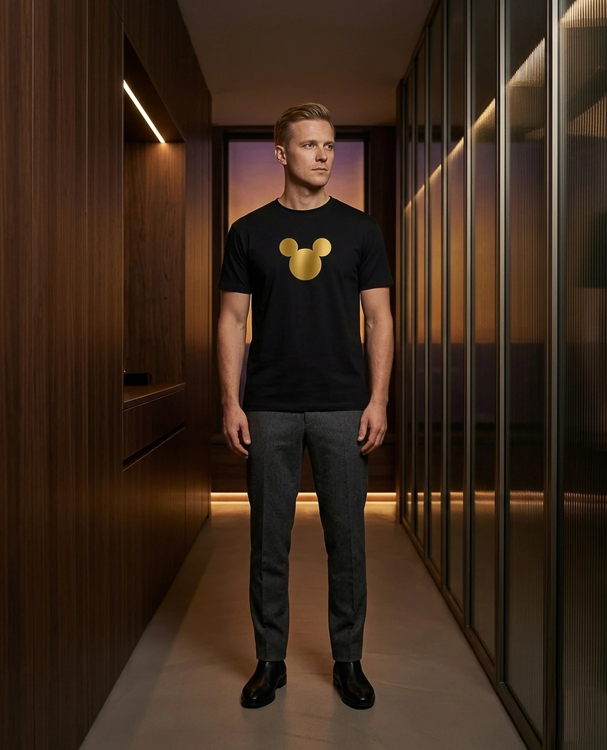 Black Mõmmi or something T-shirt in the interior with warm evening light