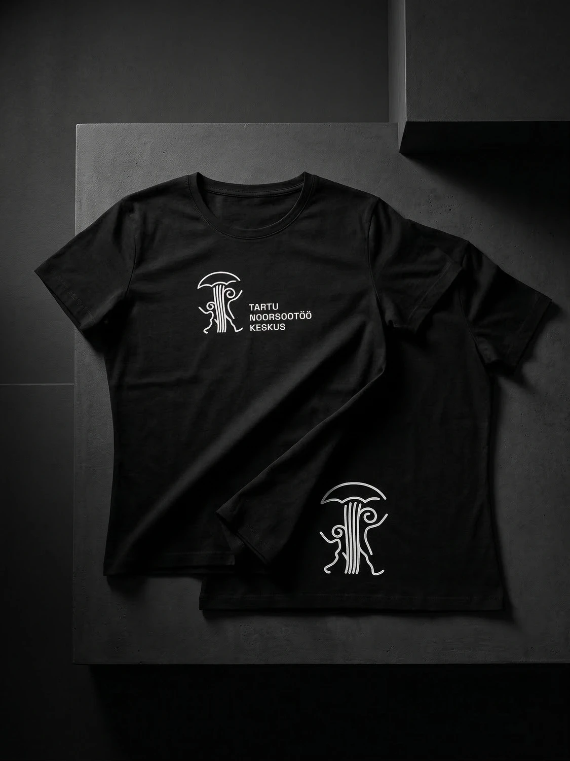 Tartu Youth Work Centre team shirts in black with front and back logo placement